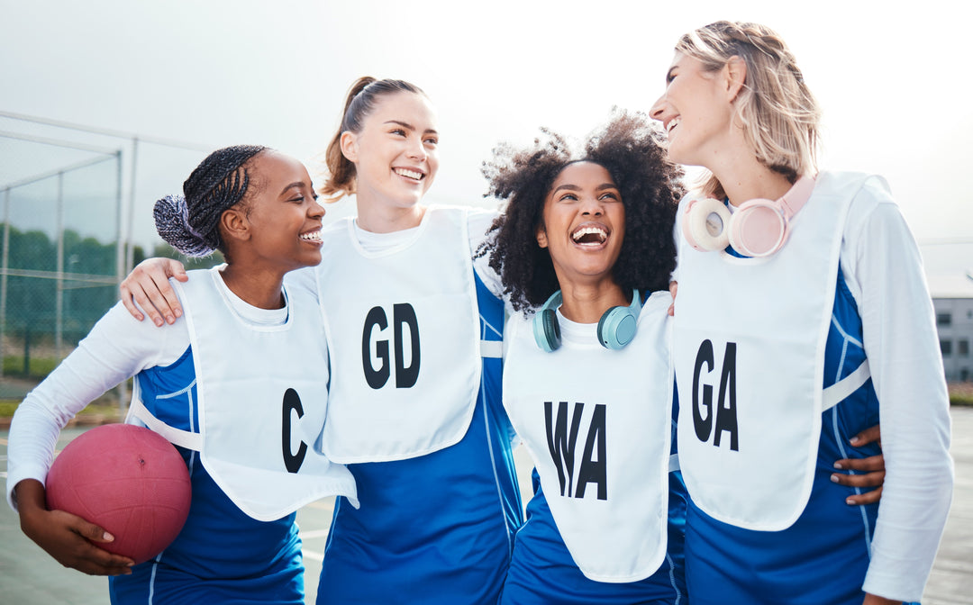 Netball, team and friends laugh, women on outdoor court together and funny, sports and diversity.