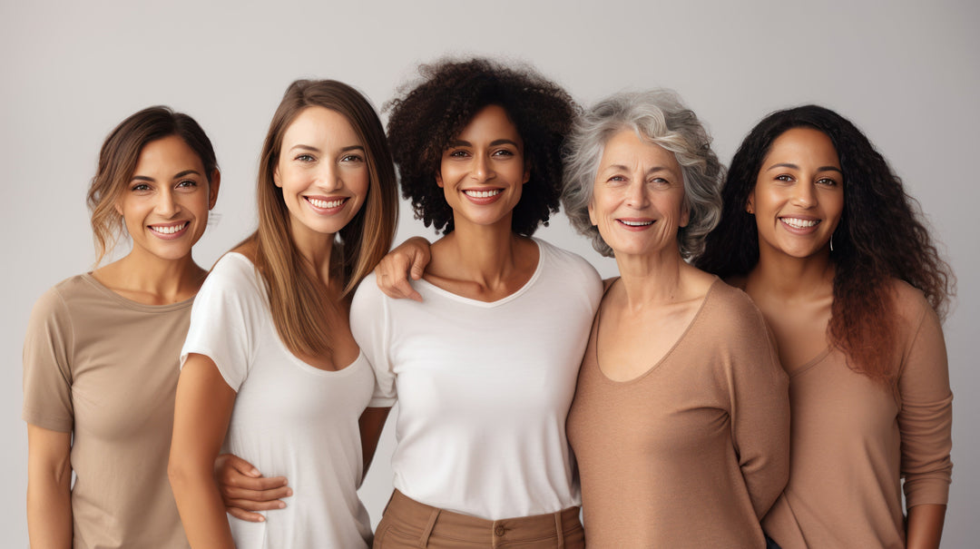 Cheerful women of different body types, ethnicities, and ages standing together
