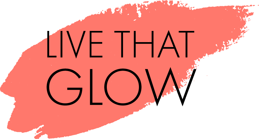 'LIVE THAT GLOW' text in black over a coral pink paint stroke on a dark grey background.