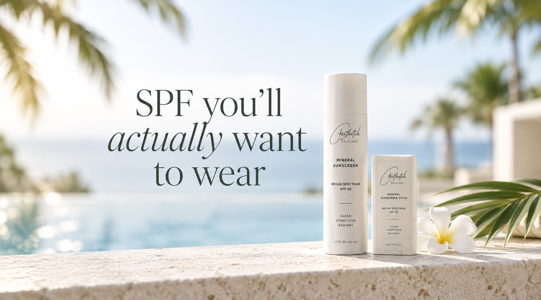  Luxury blog cover image featuring ästhetik Skincare mineral sunscreen and sunscreen stick on a sunlit stone ledge beside a pool, with palm trees in the background and the headline ‘SPF you’ll actually want to wear.’