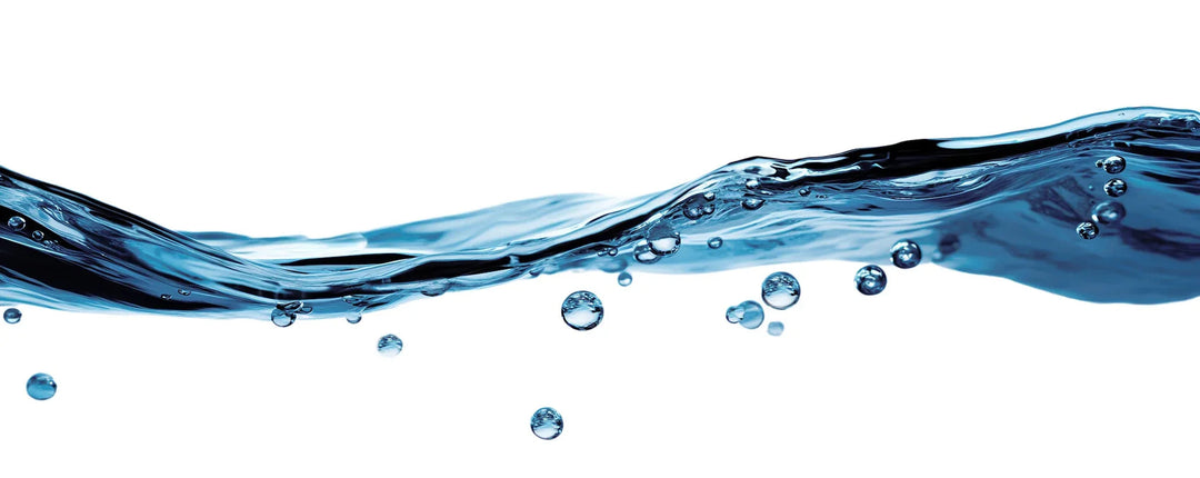 Close-up of flowing clear blue water with bubbles on white background for hydration and skincare concepts