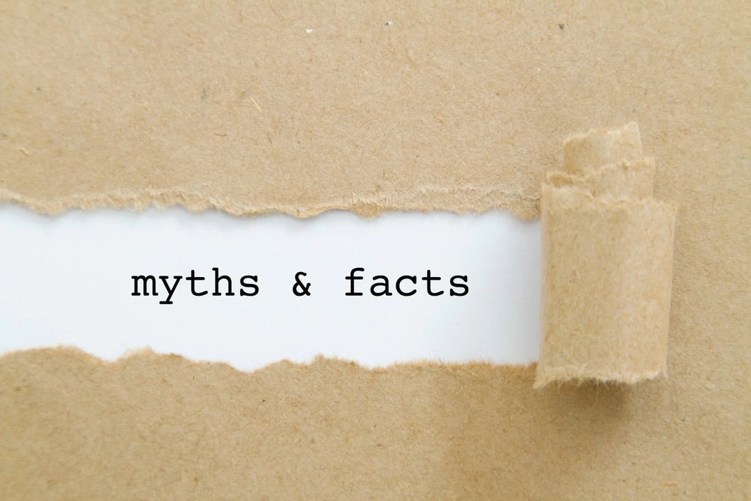 Brown torn paper revealing white background with text myths & facts in typewriter font