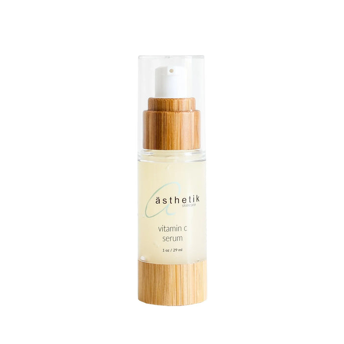 ästhetik skincare vitamin c serum in a clear bottle with a bamboo cap and pump