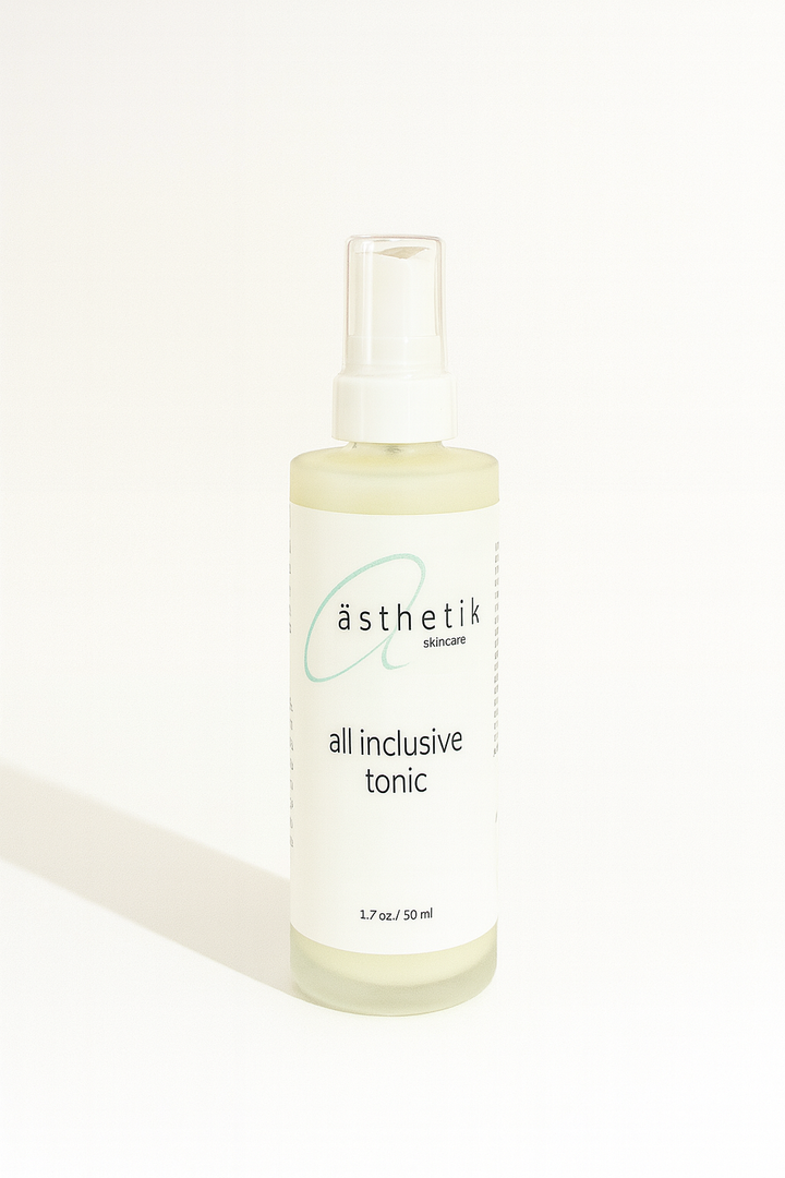 Bottle of 'all inclusive tonic' by asthetik on a white background