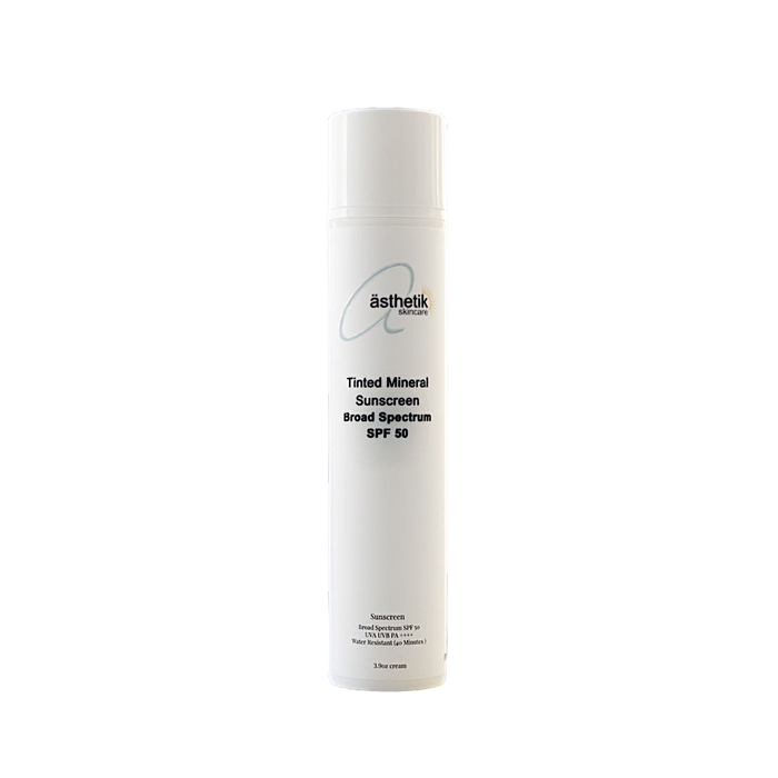 White bottle of asthetik tinted Mineral Sunscreen on a white background