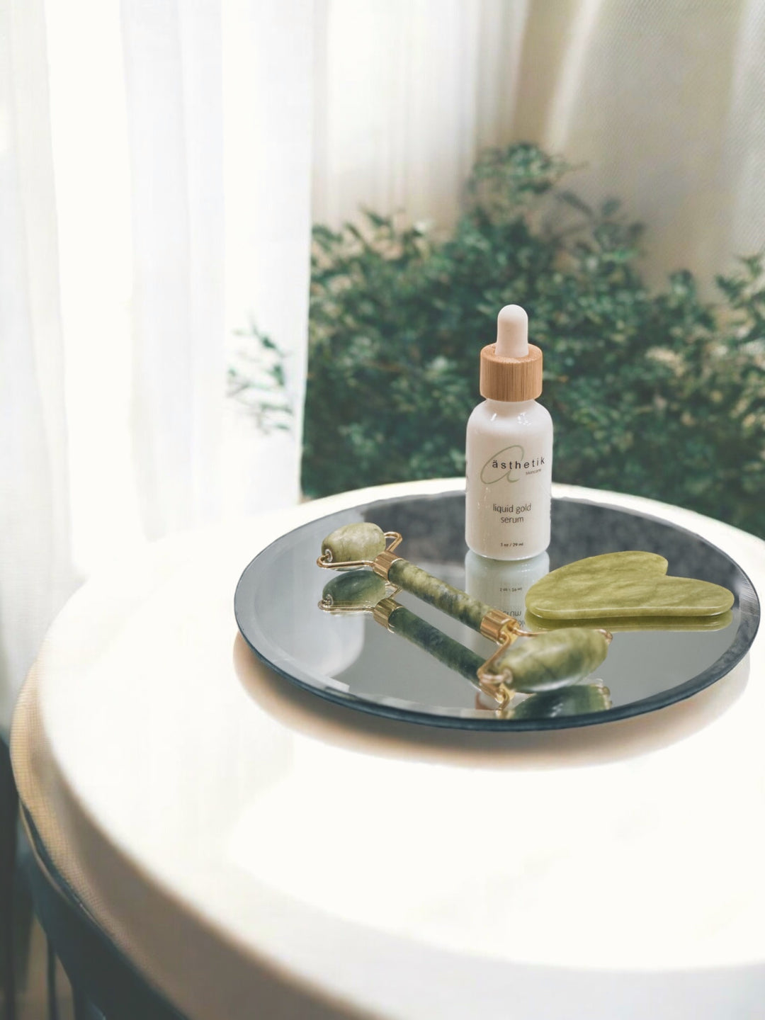 liquid gold serum + FREE gua sha & jade roller set
