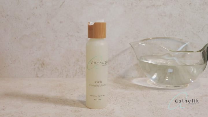 person using the refresh exfoliating cleanser from asthetik skincare